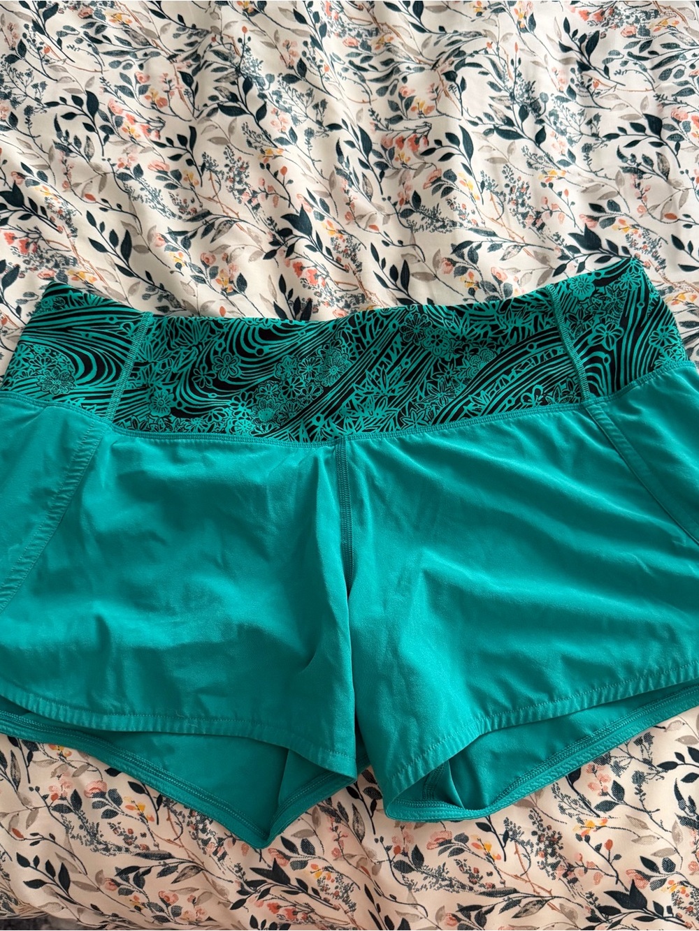 lululemon teal shorts with patterned waistband